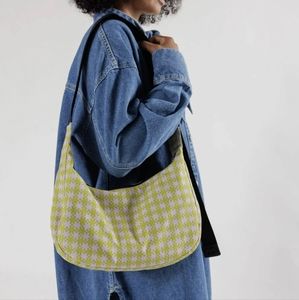 Baggu medium crescent bag in pink pistachio pixel gingham